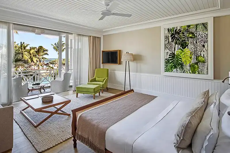 Chambre élégante avec balcon et vue sur la mer à l’hôtel Heritage Telfair